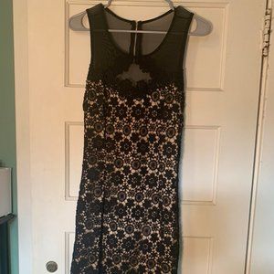 Mesh top cocktail dress with open back